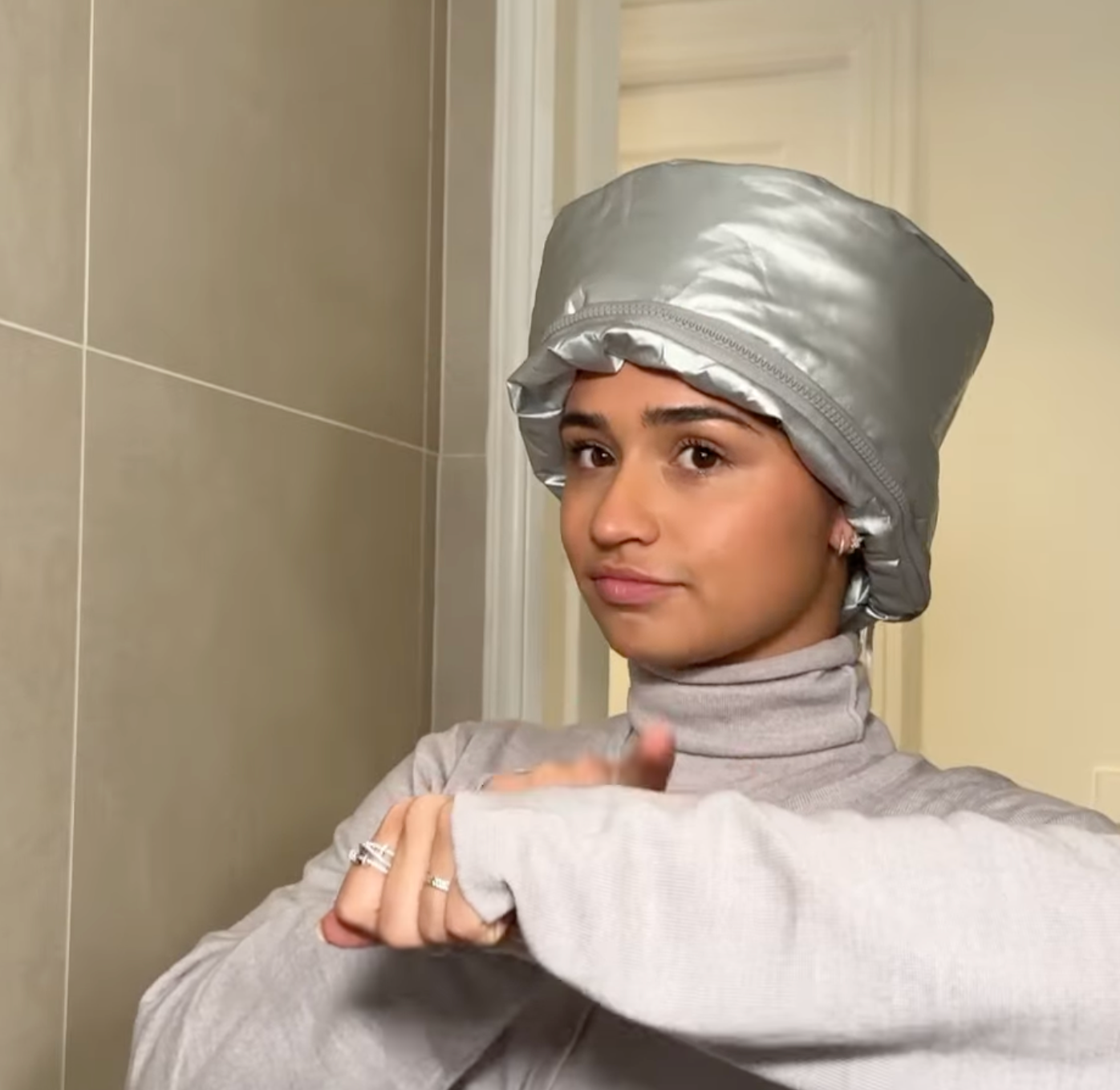 Hot oil treatment setup at home with warm oil and towel for deep conditioning hair